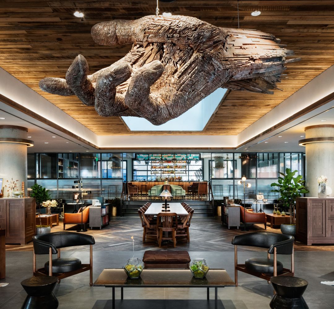 Hand sculpture hanging over lobby